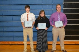 Golfers who were recognized for earning All-Conference awards are, from left, Eli Moore, Maggie Adams and Evan Mason.