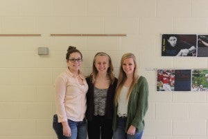 Yearbook Club editors are pictured, from left, Elizabeth Devin, Kendall Bowman and Hannah Conwell.